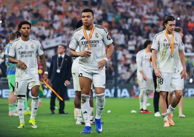 1768271303430014254.jpg 2026-01-11T213511Z_970039798_UP1EM1B1NYMLY_RTRMADP_3_SOCCER-SPAIN-BAR-RMA.jpg